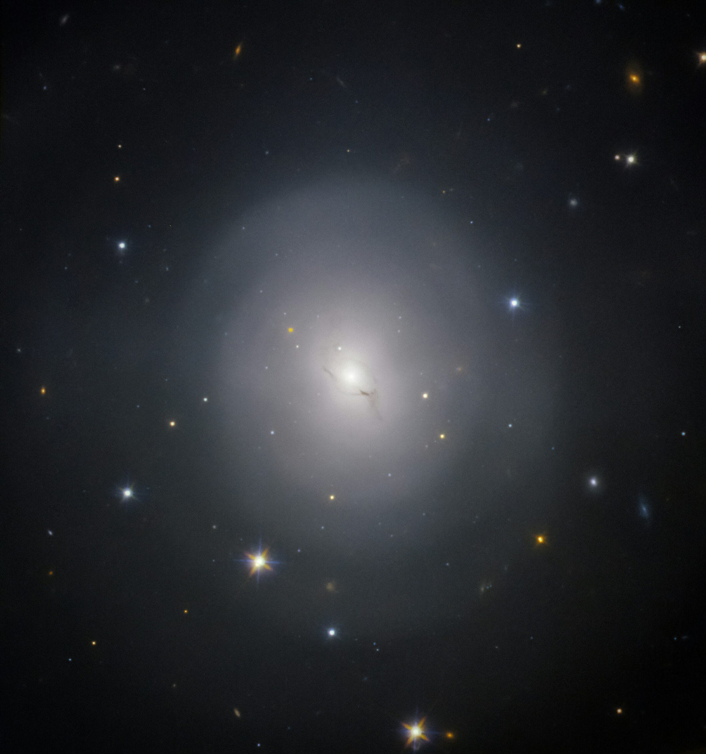 a very bright white object in the middle of a dark sky